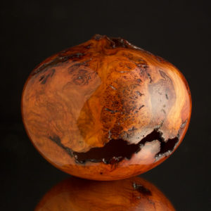 woodturning art - Ultra Gloss Voided Cherry Burl Hollow Form